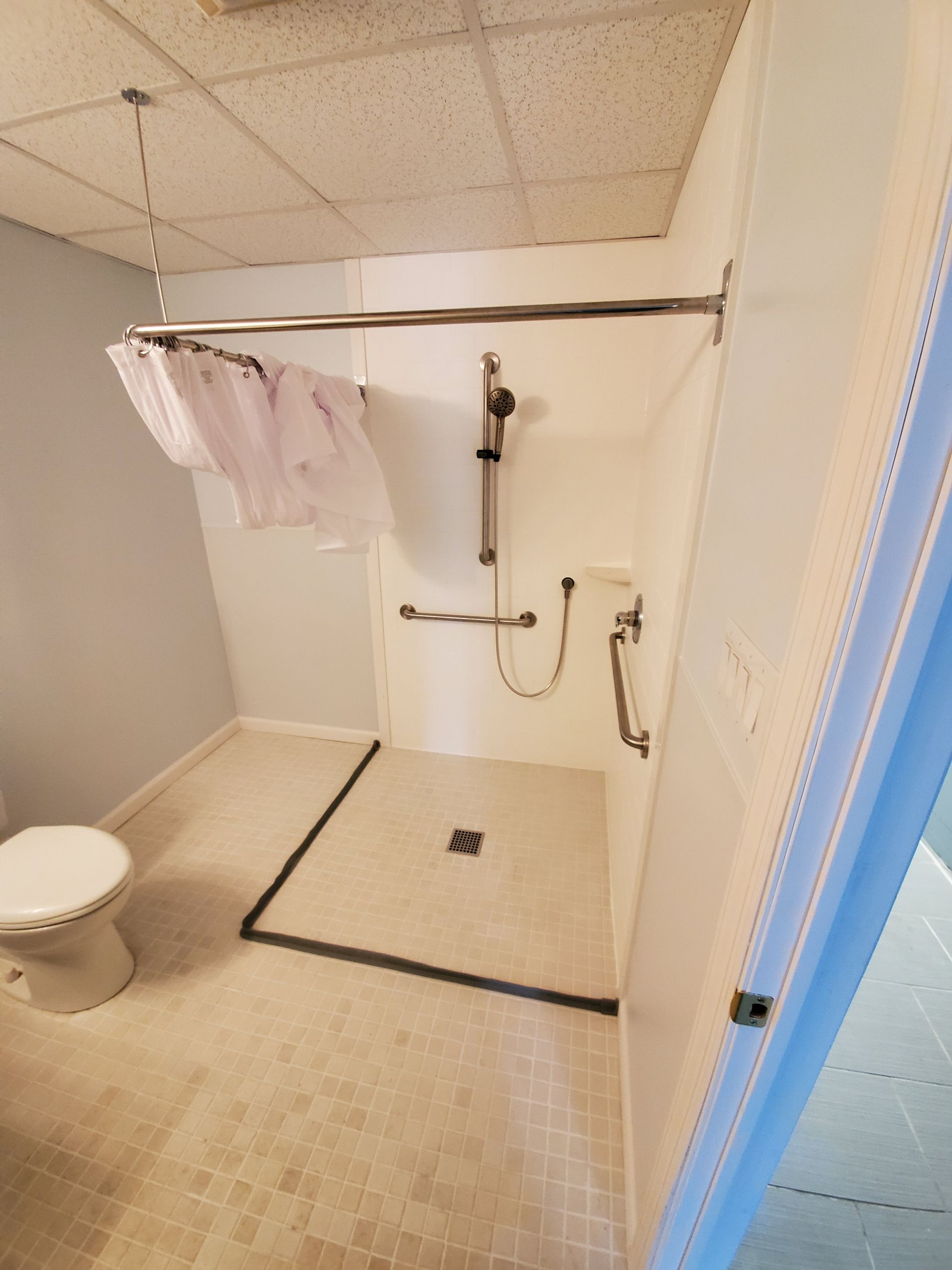Barrier-free roll-in shower installed by Altamira