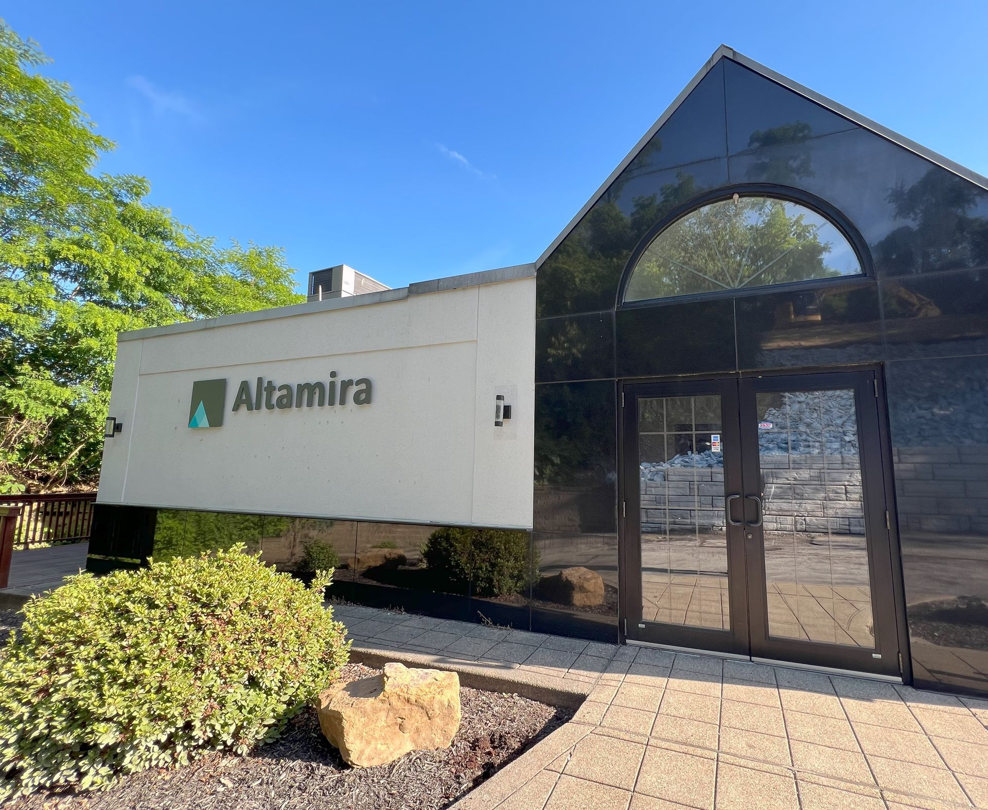 The Altamira storefront building sign, click to watch the capabilities video.
