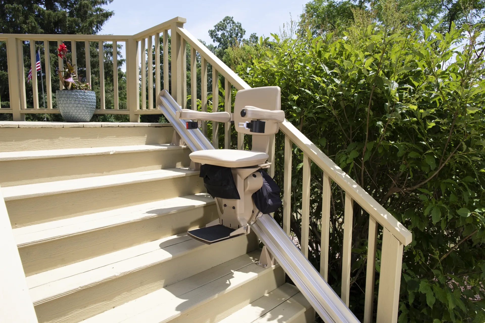 A Bruno outdoor straight stairlift installed on exterior stairs by Altamira Ltd.