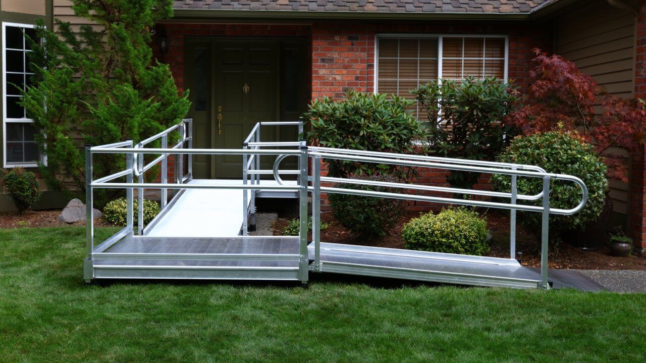 EZ-ACCESS PATHWAY 3G modular wheelchair ramp system installed at a home's entrance