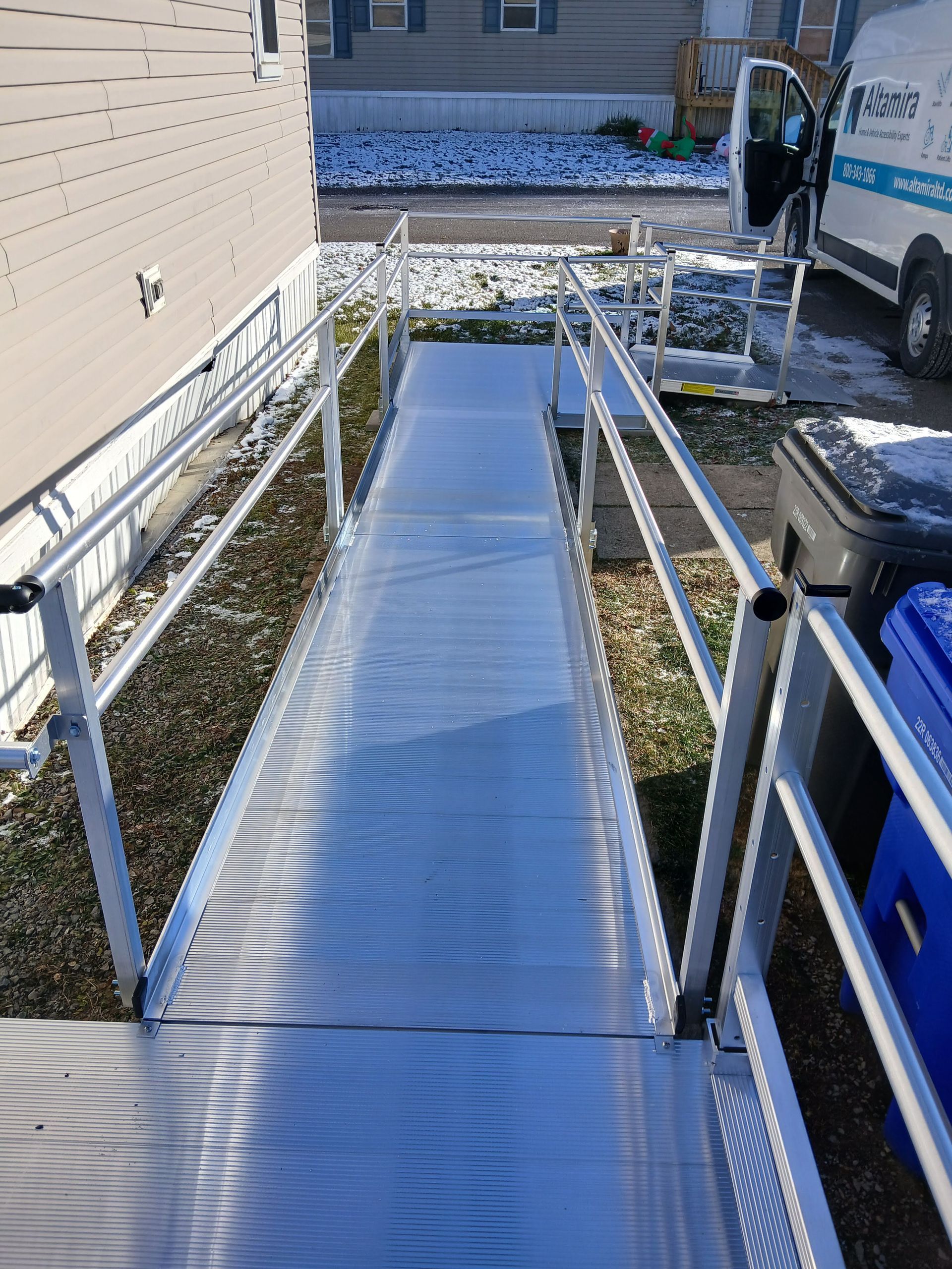 Modular wheelchair ramp installed at the entrance of a home