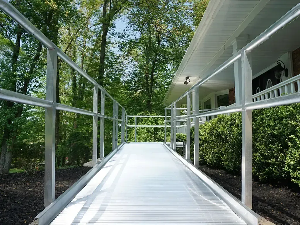 Aluminum wheelchair ramp with handrails