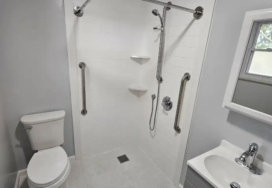 Bathroom modifications by Altamira Ltd. featuring an accessible shower.