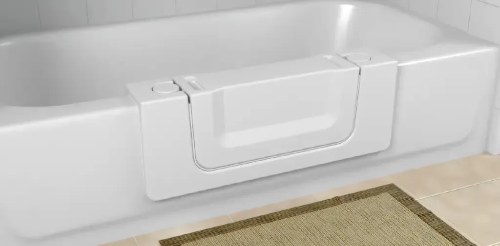 An accessible bathtub with a door from a tub cut service from Altamira Ltd. and a rug on the floor.