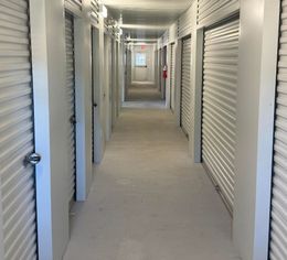 Interior hallway of climate-controlled storage units at Advanced Mini Storage in Zachary, LA