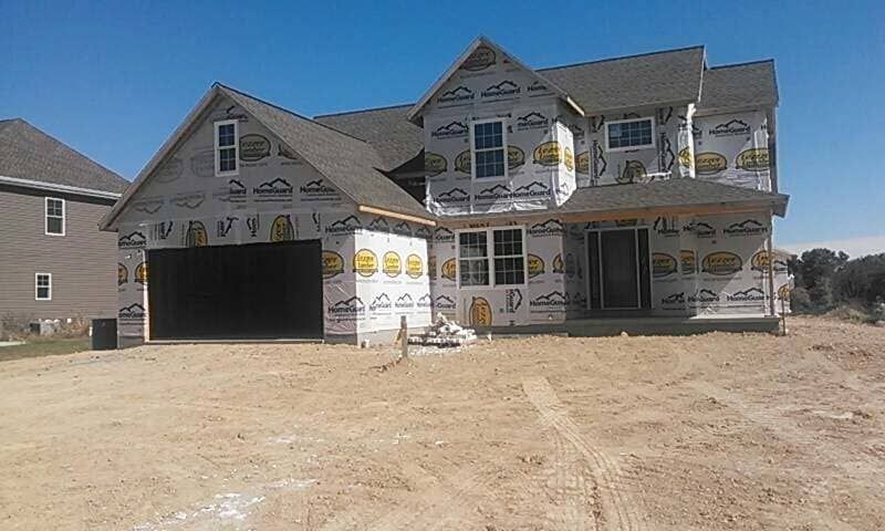 Custom House Being Built In A Dirt Field