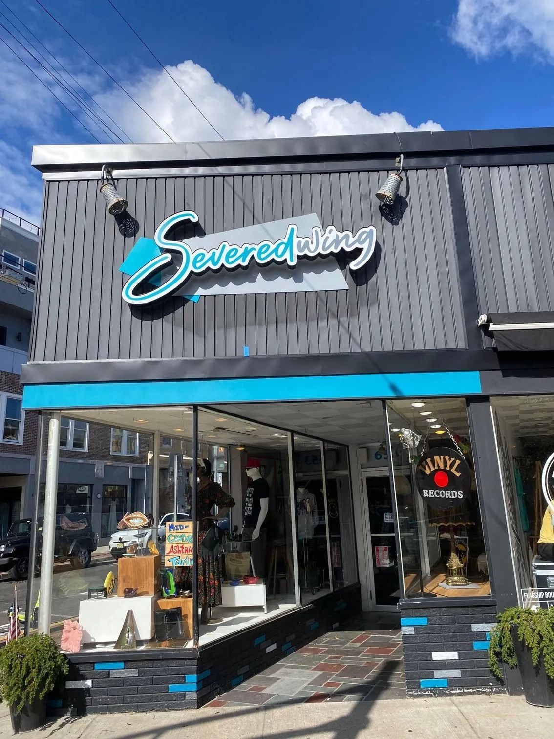 Storefront with a turquoise 
