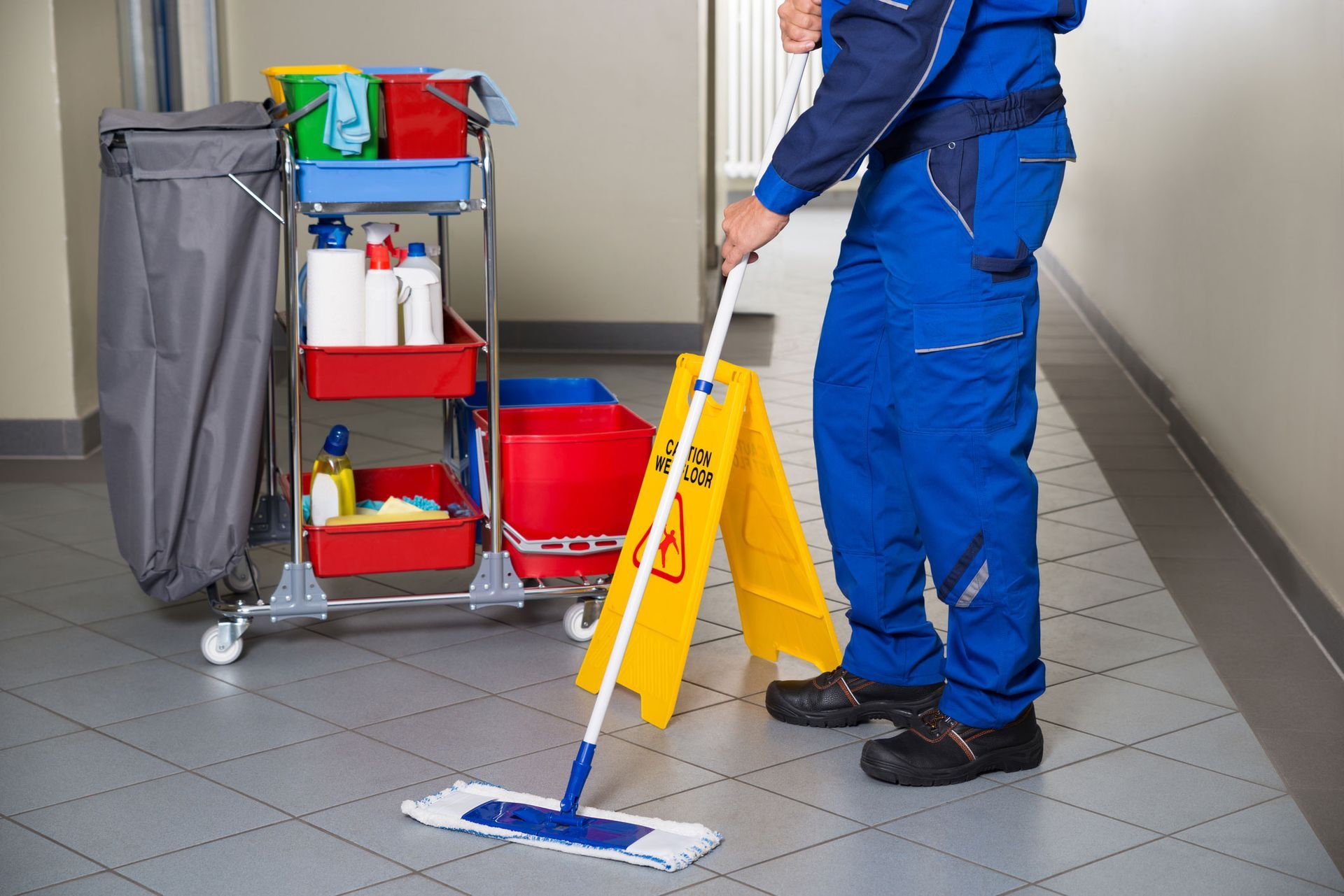 Janitor Cleaning Office Corridor — Fresno, CA — The Janitorial Company
