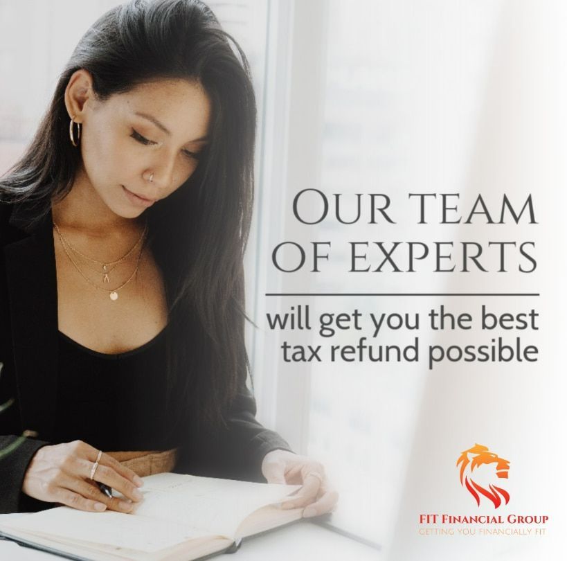 Woman Reviewing Documents by a Window — Fit Financial Group in Leumeah, NSW