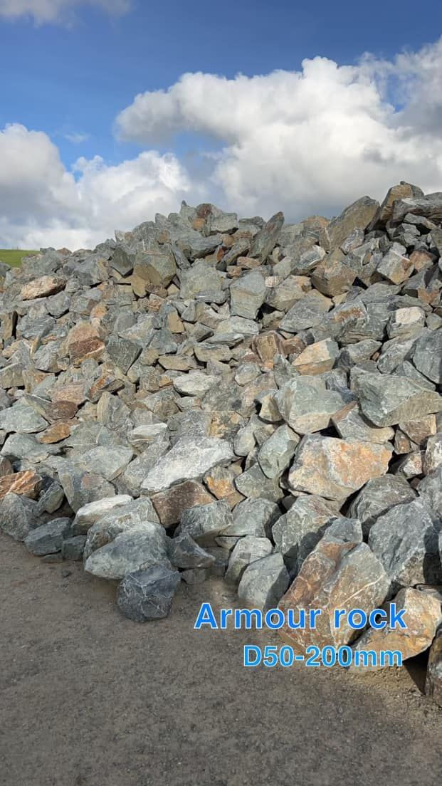 Pile of Armor Rock, Mostly Gray, with Some Tan Pieces — Barlow's Earthmoving in Coorooman, QLD