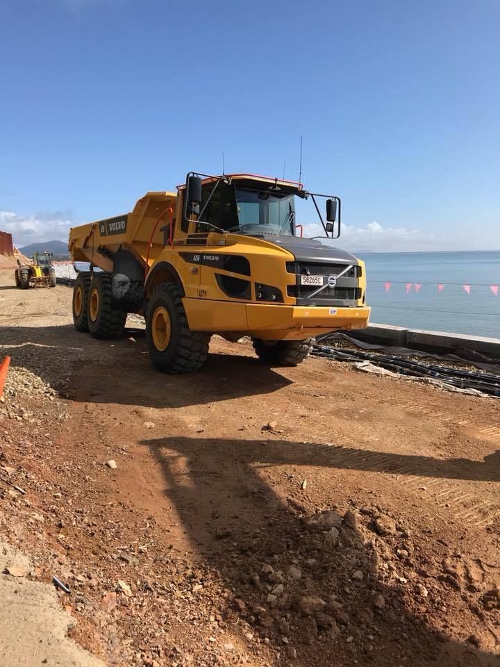 Yellow Articulated Volvo Dump Truck — Barlow's Earthmoving in Gladstone, QLD