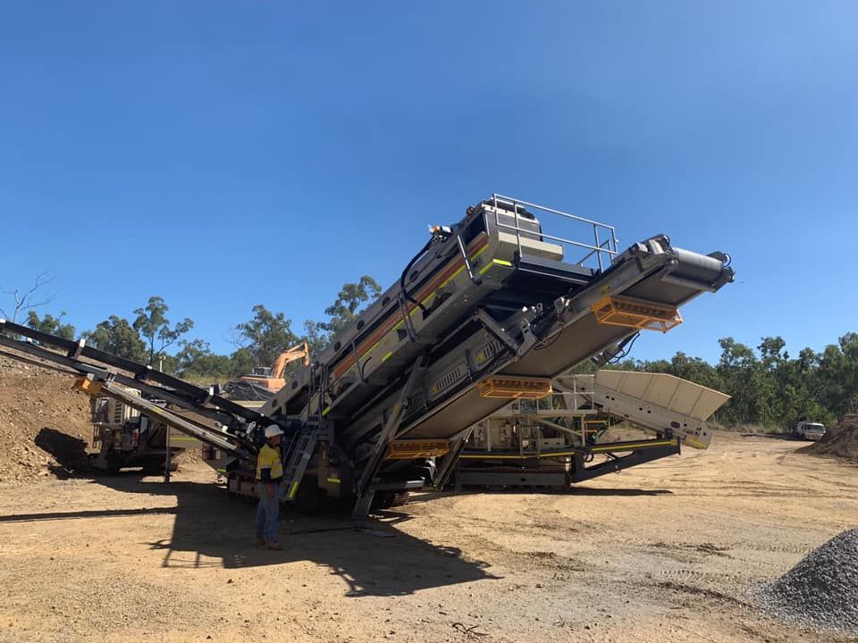 Mobile Rock Crusher at A Quarry, Separating Materials; Blue Sky — Barlow's Earthmoving in Gladstone, QLD