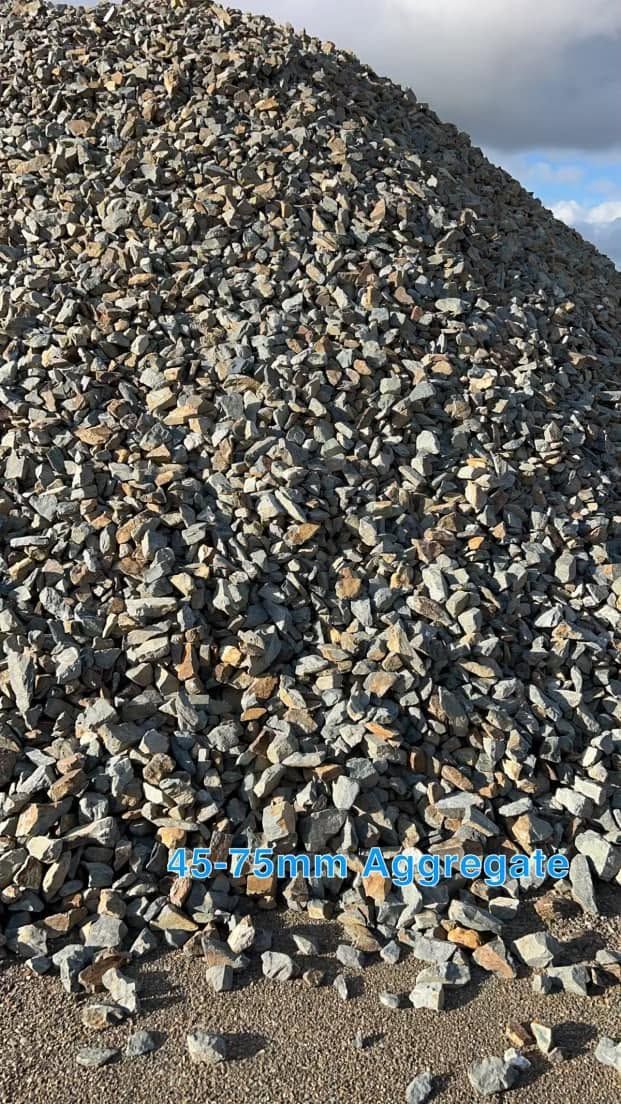 Large Pile of Gray and Brown Rocks or Gravel Outdoors Under a Cloudy Sky — Barlow's Earthmoving in Coorooman, QLD