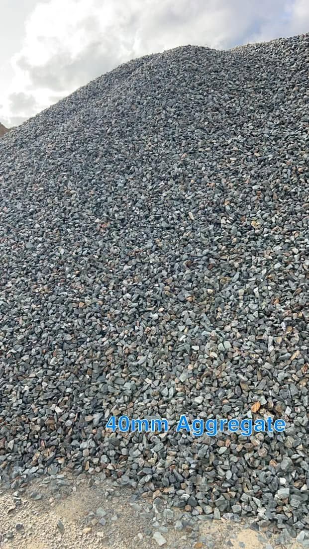 Large Mound of Gray Gravel or Crushed Stone Piled Outdoors — Barlow's Earthmoving in Rockhampton, QLD