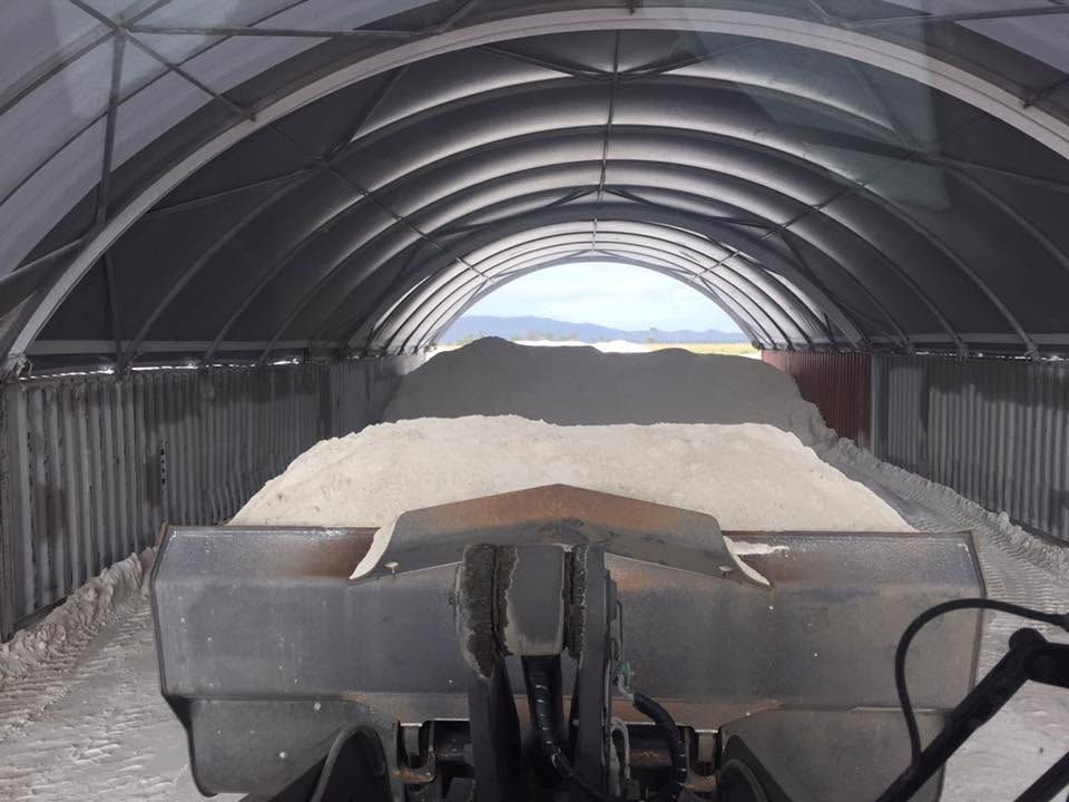 Snow Piled Inside an Arched Shed, Viewed From a Front Loader Bucket — Barlow's Earthmoving in Coorooman, QLD