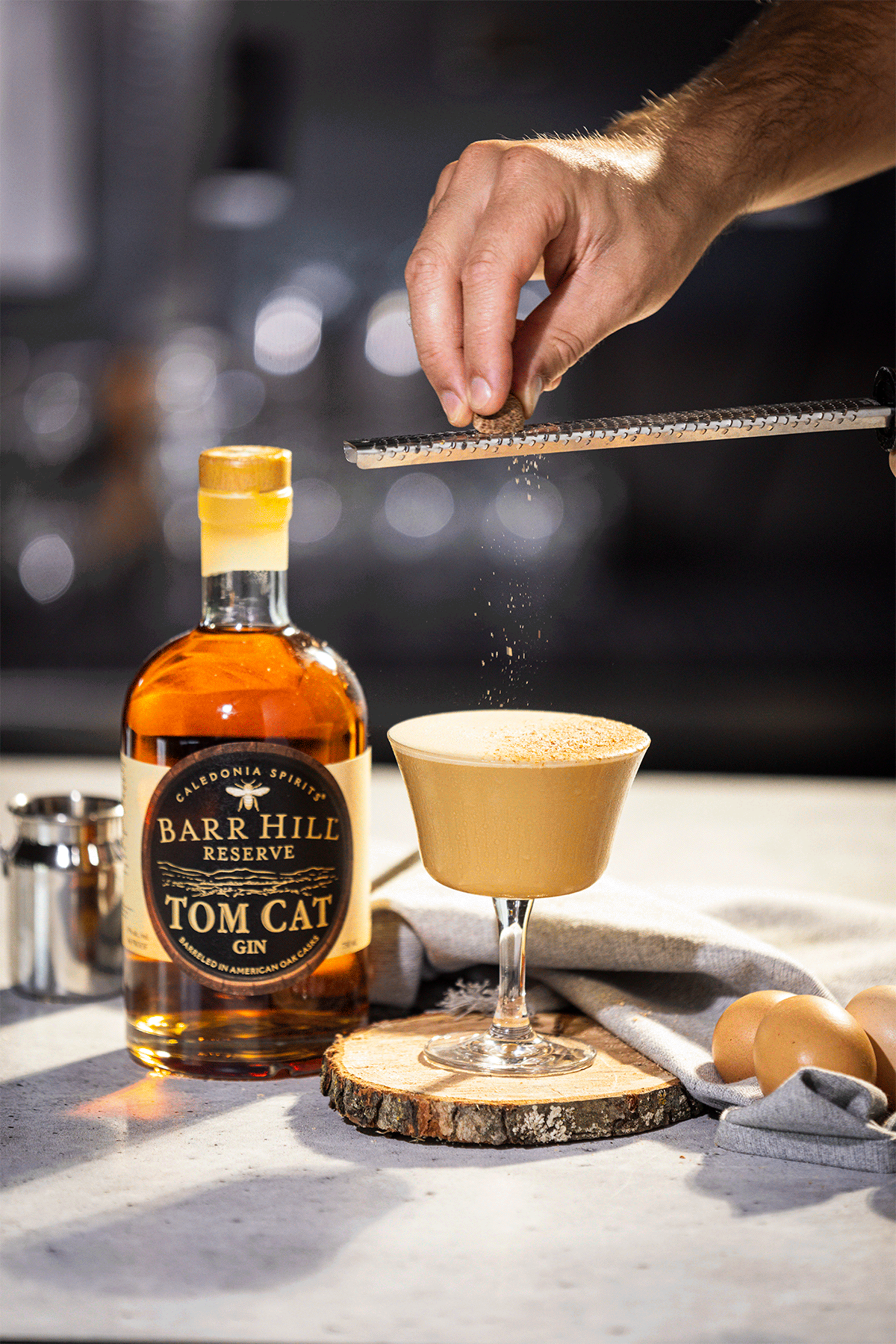 beverage photography for barr hill tom cat gin - nutmeg grated over cocktails.