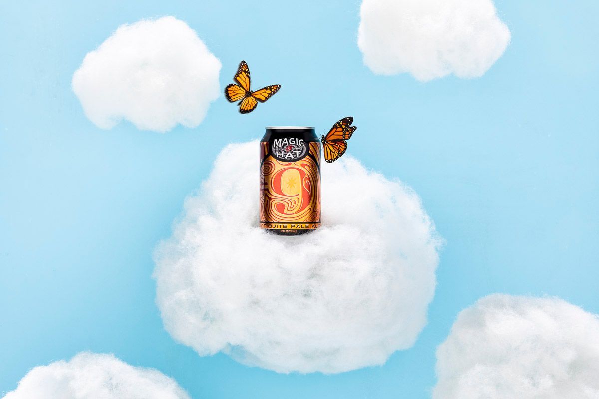 Magic Hat Number Nine with butterflies, clouds and blue sky. Beverage product photography by JAM Creative.