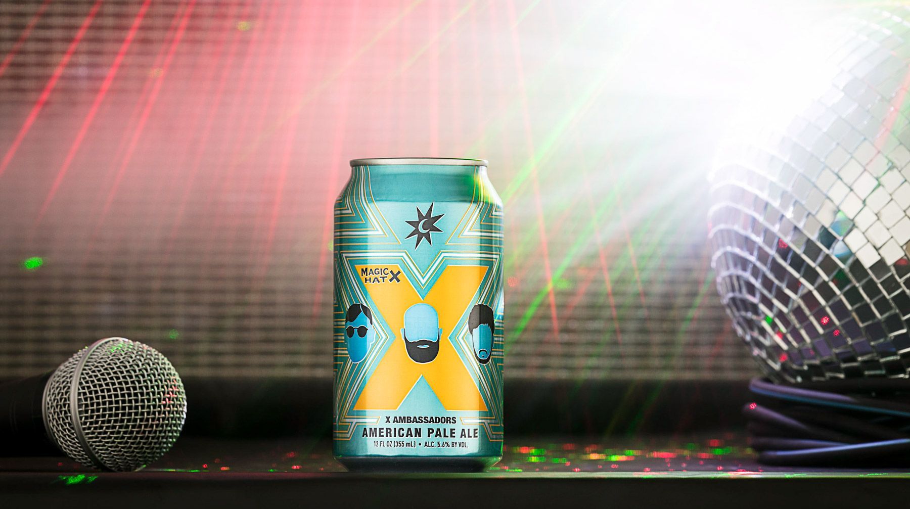 Beverage product photography of Magic Hat X Ambassador beer at concert by mic + disco ball. JAM Creative photographers