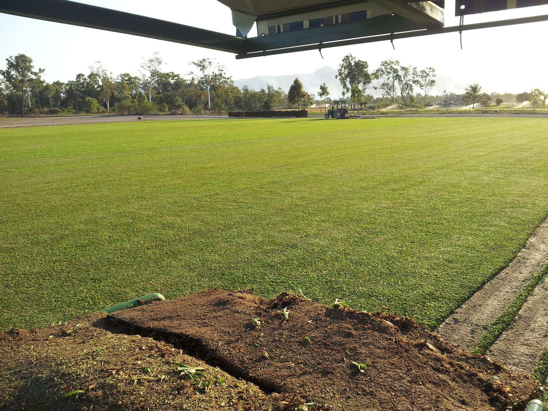 Green Golf Course, View from Tee Box, Mountains in Background — Top Notch Turf in Winton, QLD