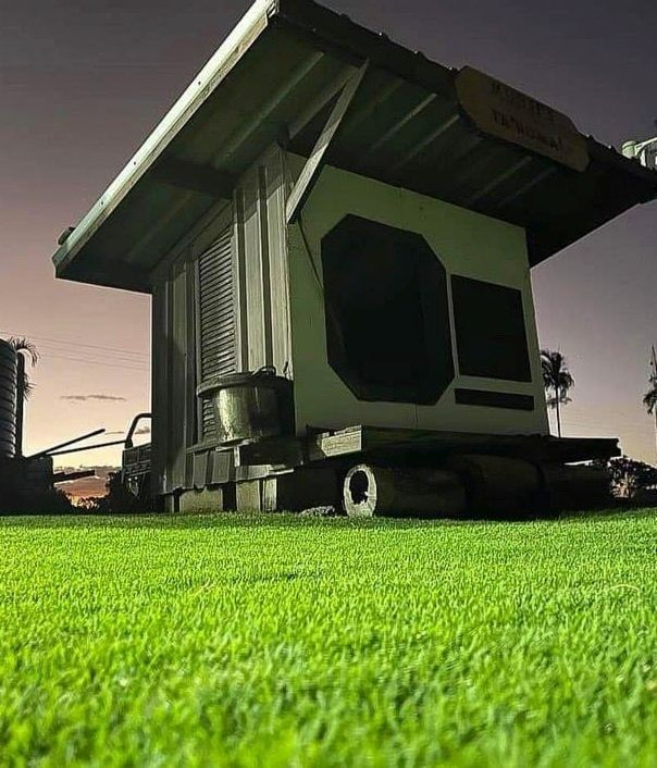 Wooden Structure with Angled Roof, on A Grassy Field — Top Notch Turf in Rasmussen, QLD