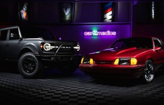 A Ford Mustang and Bronco in a photoshoot after getting ceramic coatings.