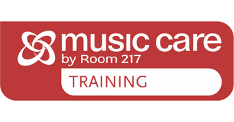 A red sign that says music care by room 217 training