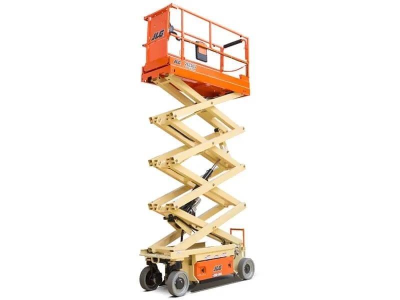 Orange scissor lift raised high, with folded metal platform and wheels on a white background