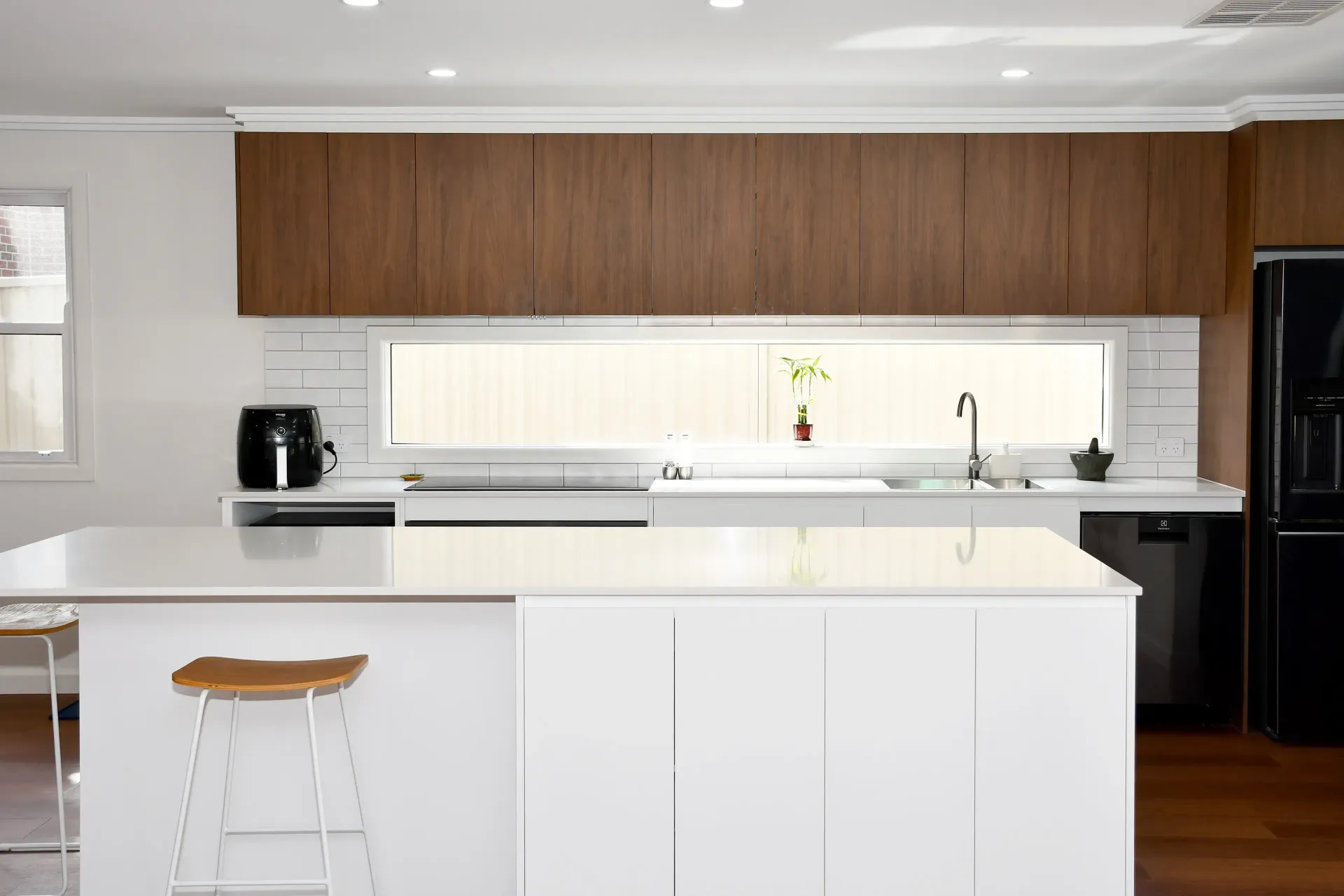 Creative Cabinetry recently completed this major kitchen and laundry renovation in Soldiers Hill, Ballarat. Stunning white benchtops and simple splashbacks, mixed with dark natural woods and bevelled edged cabinet doors - creating a beautiful space.