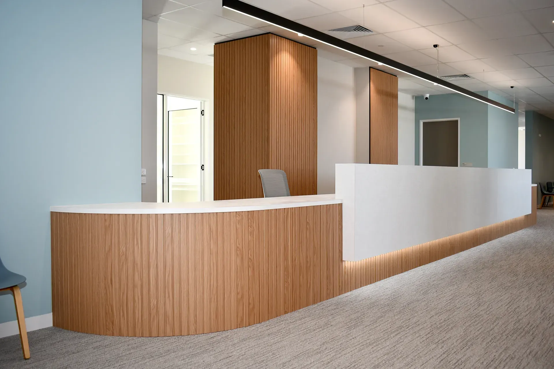 Creative Cabinetry was commissioned to design and build custom cabinets for 48 rooms at UFS Medical Centre in Lucas, Ballarat, including an 11.5m reception desk. 