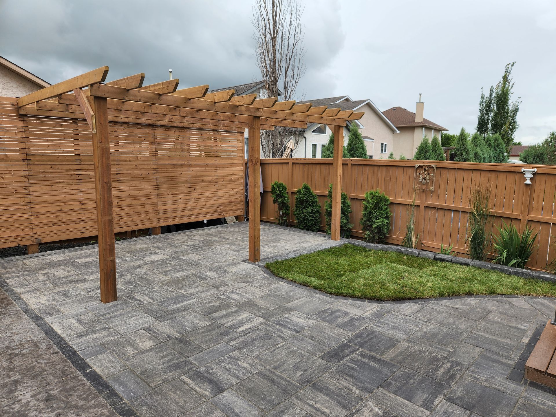 Stone patio with pergula