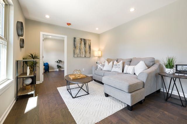 living room with a grey couch