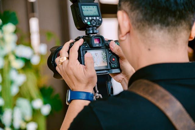 A professional photographer taking property photos