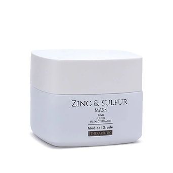 White jar labeled “Zinc & Sulfur Mask” on a plain background