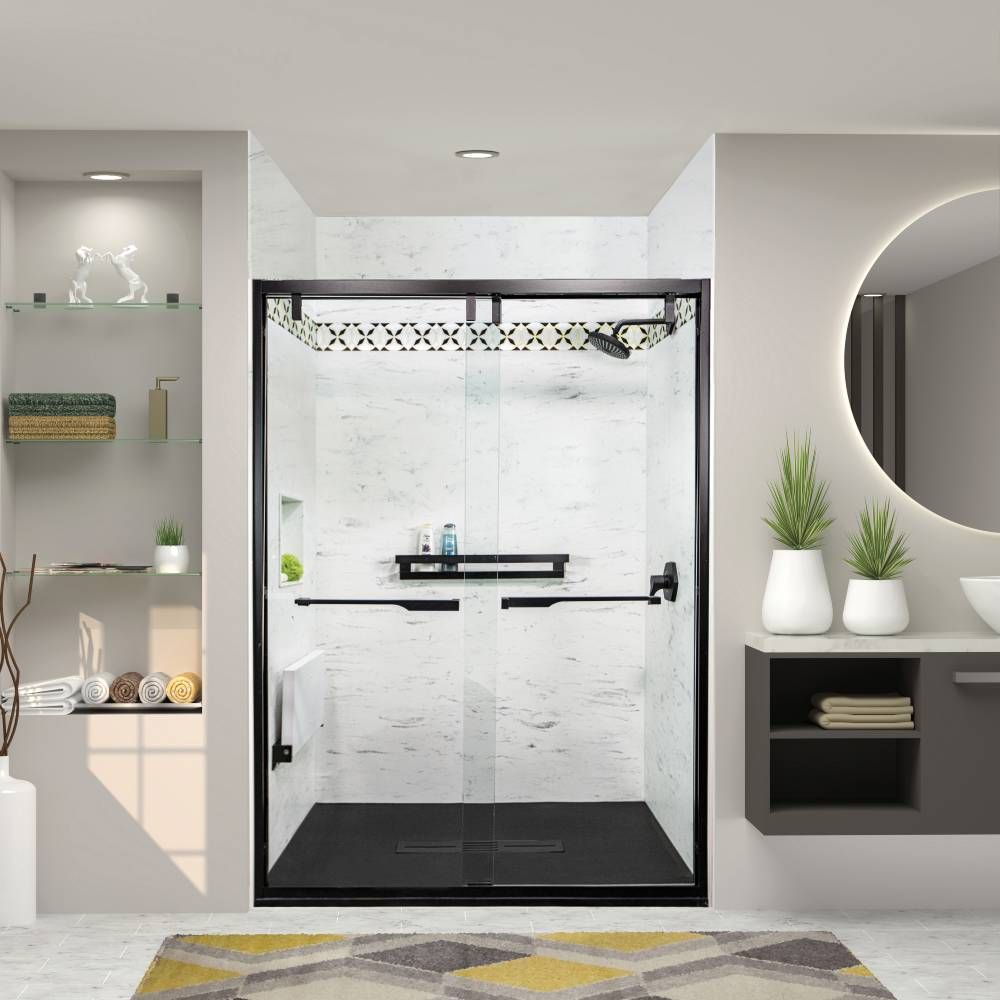 A curbless, barrier-free walk-in shower installed in a Piney Point Village home, with frameless glass panels, slip-resistant flooring, a fold-down teak bench, stainless grab bars, and a low-maintenance acrylic wall system. The aging-in-place design removes the step-over tub wall for safer entry. Cascade Showerworks builds ADA-friendly walk-in showers like this in about one day for Piney Point Village homeowners and across Greater Houston.