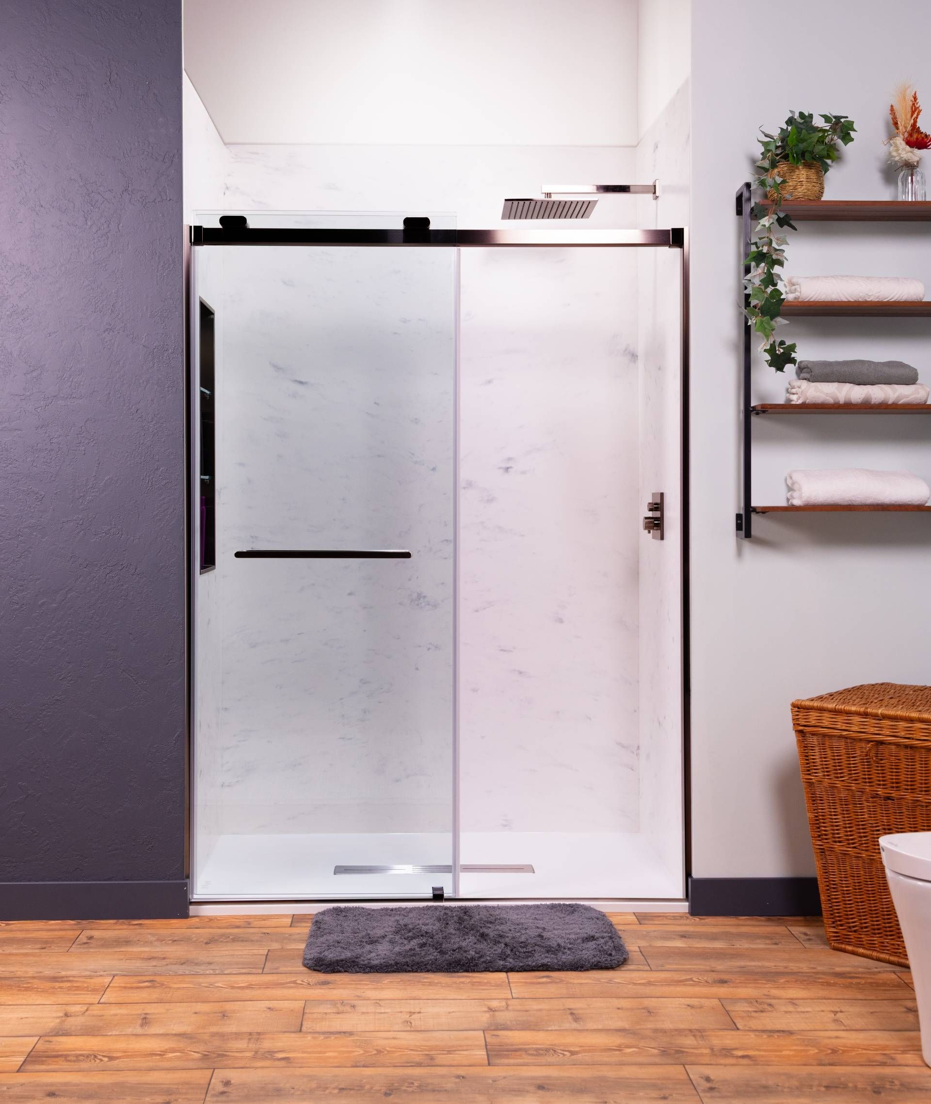 A cutaway view of a League City walk-in shower engineered for Gulf humidity by Cascade Showerworks, showing sealed seamless wall panels with no grout lines, modern waterproofing membrane behind them, a properly sized exhaust path, and a frameless glass door. The image contrasts the bay-climate failure cycle of moldy grout and failing caulk with a sealed system that gives humidity nothing to attack, backed by a lifetime transferable warranty for Bay Area homeowners.