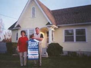 A couple stands with a 