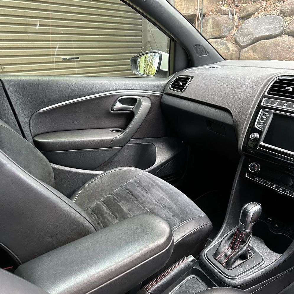 Driver's Seat, Dashboard, Door Panel, and Gearshift. Black and Gray Tones — Remedy Mobile Car Detailing in Broad Beach, QLD