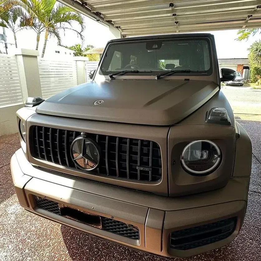A Mercedes Benz G63 Is Parked Under A Garage Door — Remedy Mobile Car Detailing in Carrara, QLD