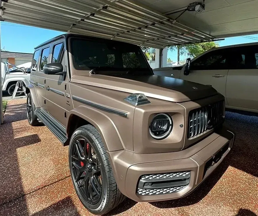 A Mercedes Benz G63 Is Parked Under A Garage Door — Remedy Mobile Car Detailing in Carrara, QLD