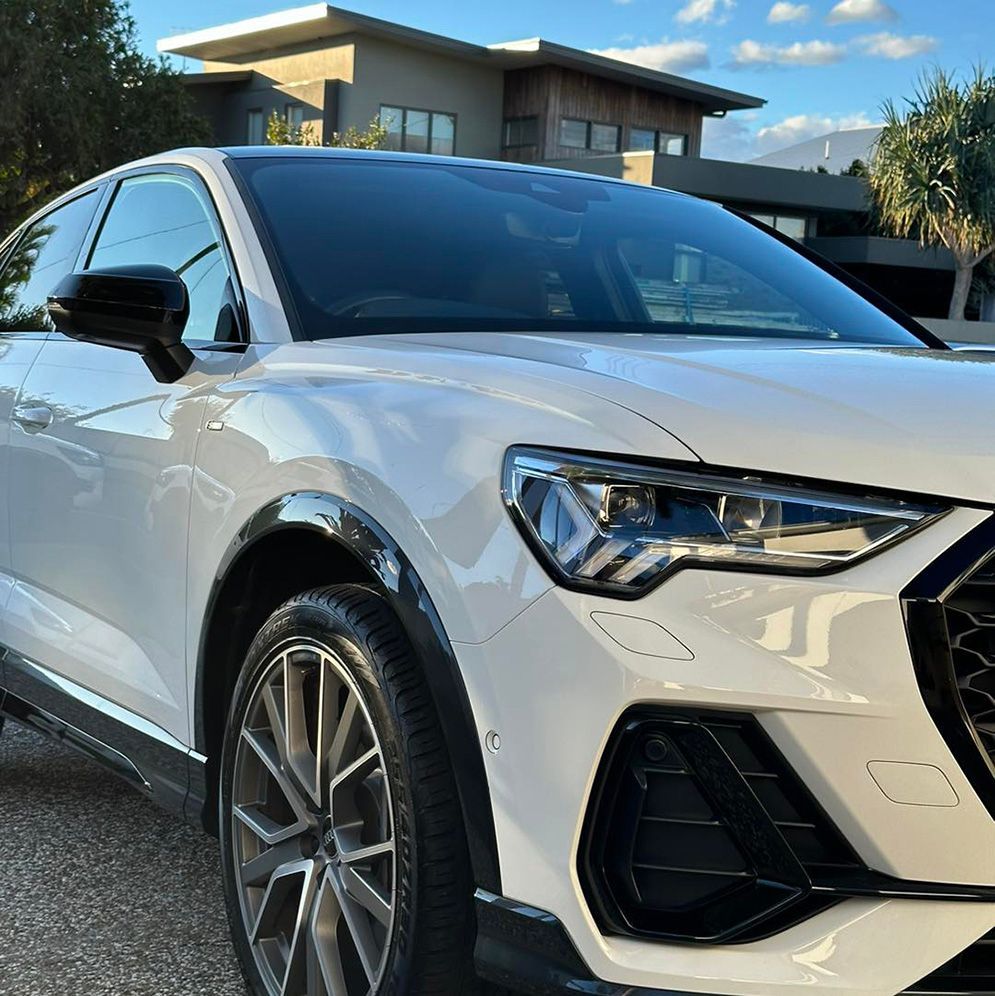 White Audi Q3 Parked in Front of a Modern House — Remedy Mobile Car Detailing in Burleigh, QLD