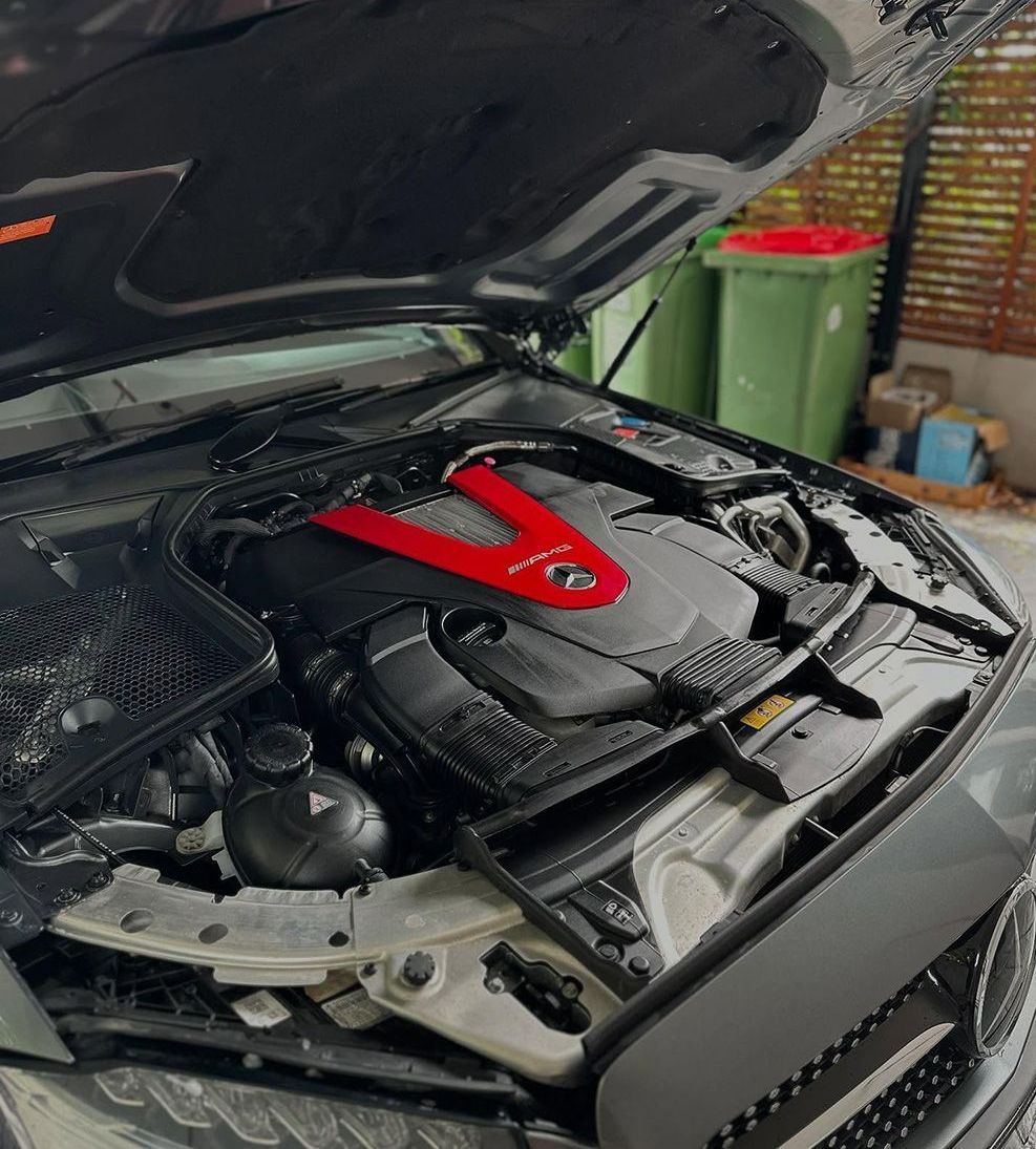 The Hood Of A Car Is Open And The Engine Is Visible — Remedy Mobile Car Detailing in Tweed Heads, NSW