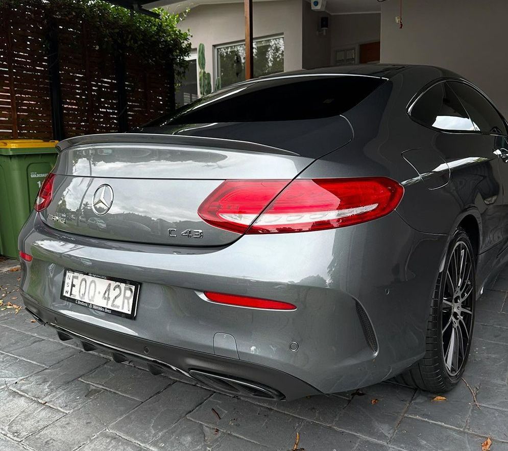 Gray Mercedes-Benz C43 Coupe Parked on A Paved Driveway — Remedy Mobile Car Detailing in Tweed Heads, NSW