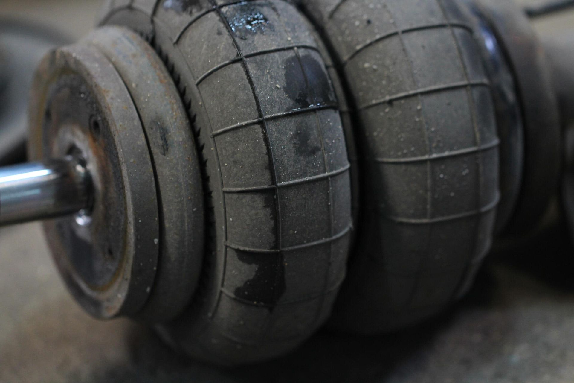 A Close Up of a Pair of Air Shock Absorbers on a Car — ANI Automotive in Long Jetty, NSW