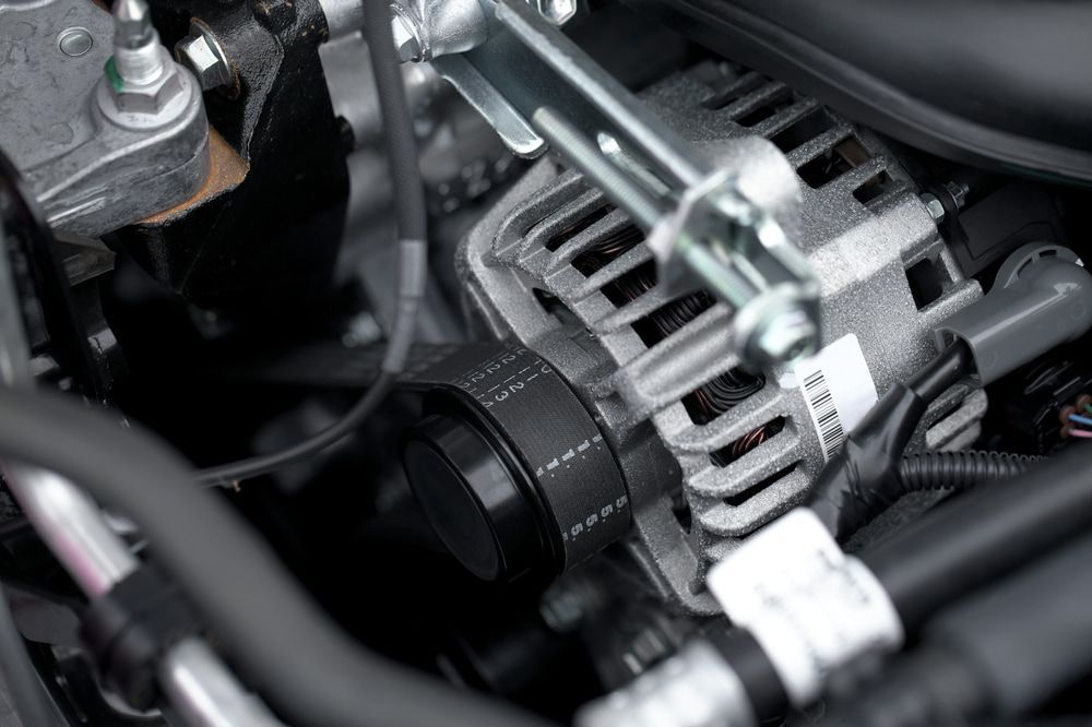 A Close Up of a Car Engine With a Alternator and Oil Filter — ANI Automotive in Long Jetty, NSW