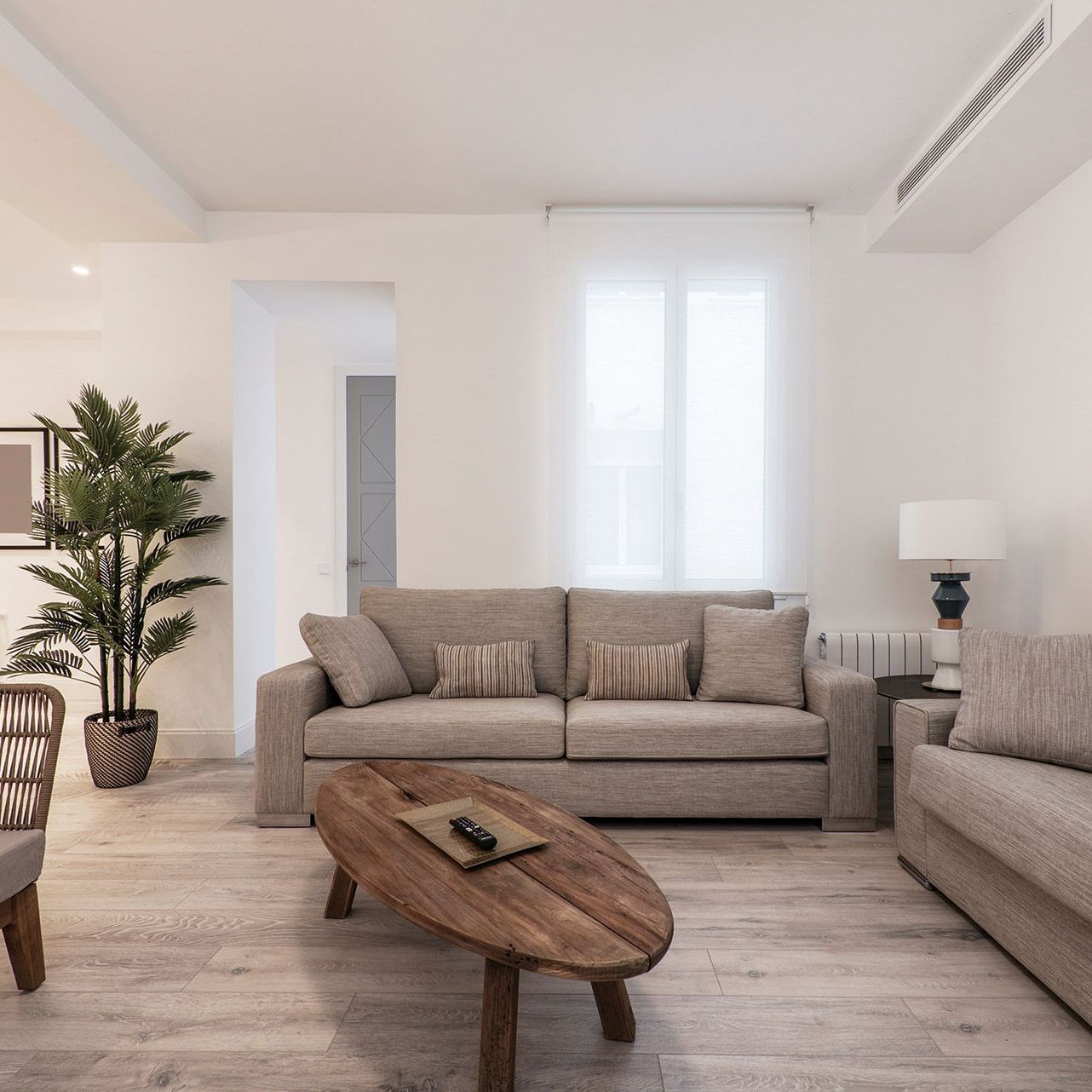 A living room with a couch and a coffee table.