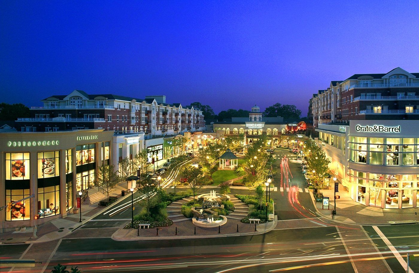 An aerial view of a shopping center at night