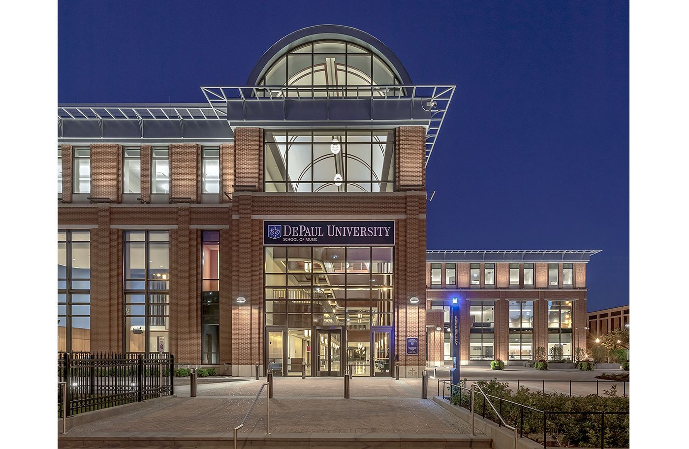 A large brick building with the word university on it