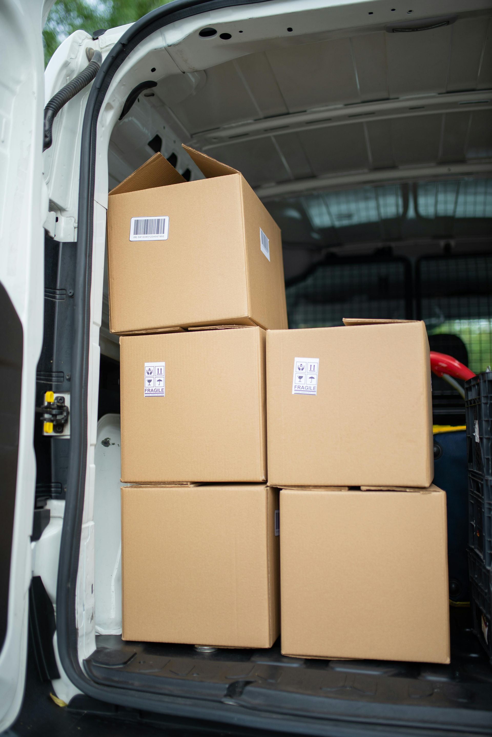 Boxes Stacked Up In A Van — Removalists In Ballina