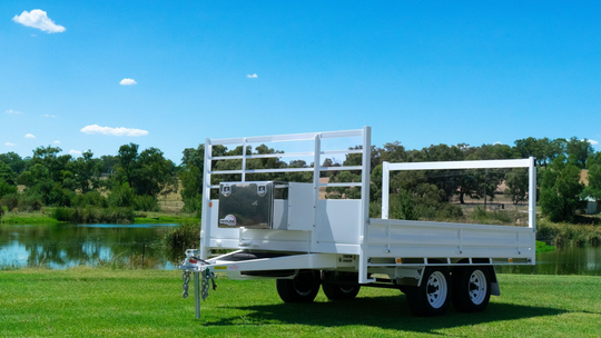 Versatile flat-deck trailers for machinery, pallets, livestock, purpose built for Builders, tradies and general farm work.