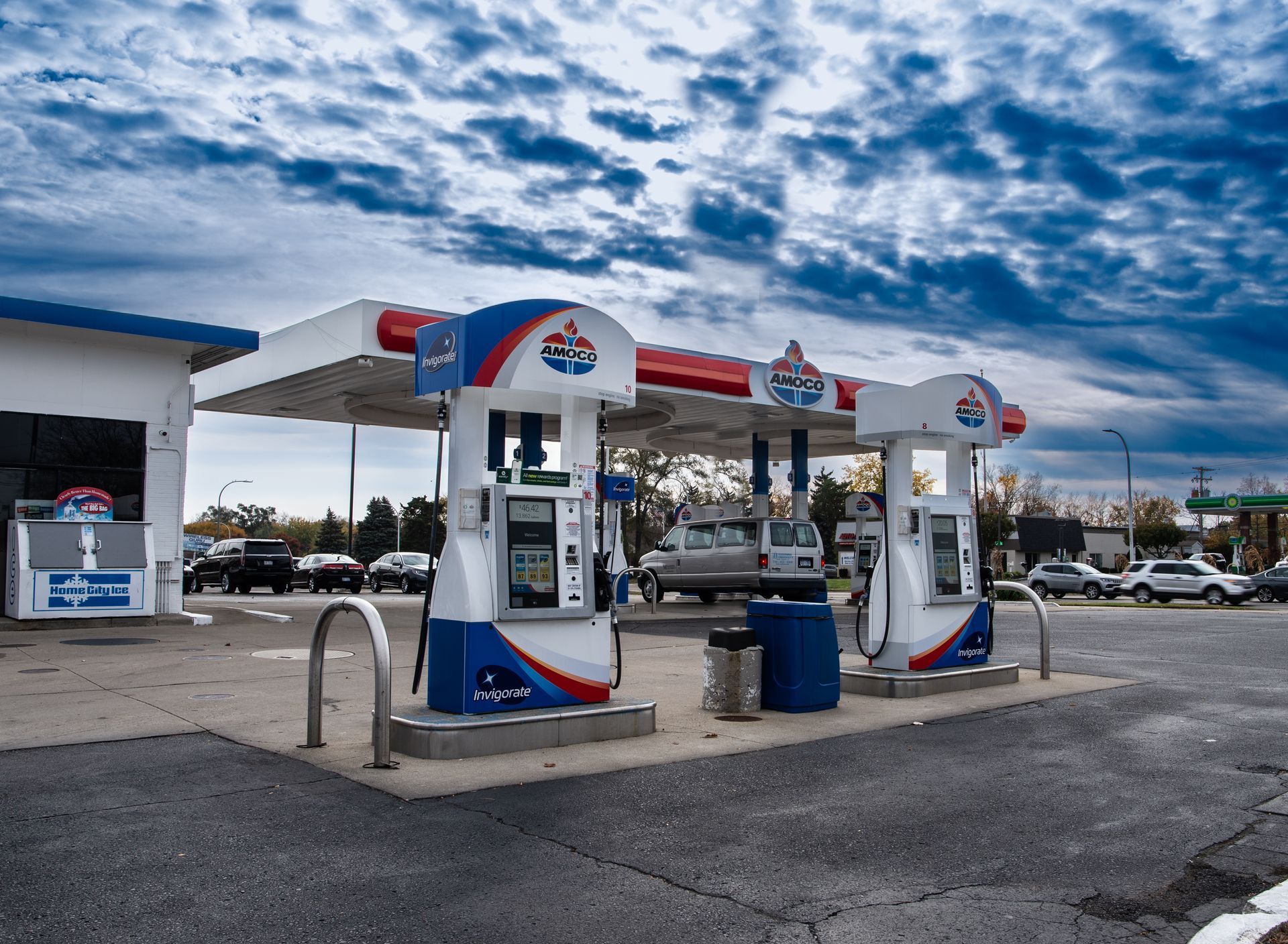 A gas station with a blue sky in the background